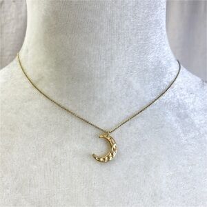 Dainty hammered matte gold tone crescent moon pendant